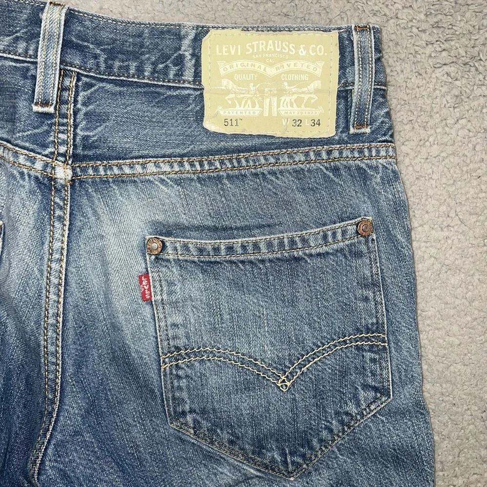 VTG Levi's 511 Jeans Men's Size 32 x 34 (32 x 30) Blue Denim Medium Wash Cut Hem
